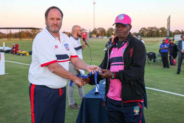 20211119 24 USA Cricket Operations Director Richard Done presents a runner up medal to South Zone coach Clayton Lambert